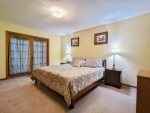 Main Level Primary Bedroom with King Size Bed with Flat Screen TV